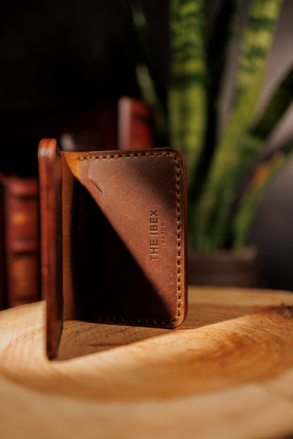 Brown leather cross wallet