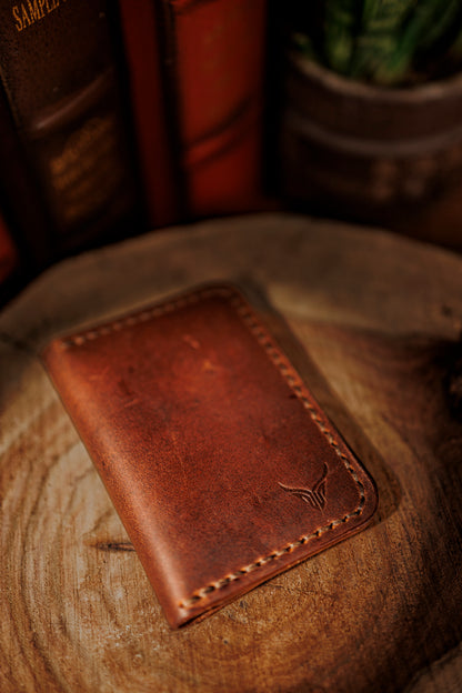 Brown leather cross wallet