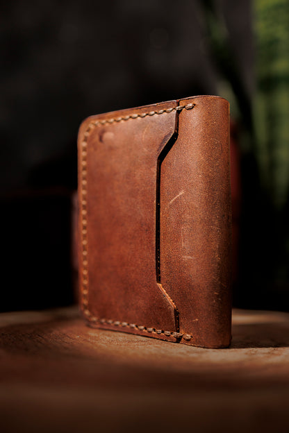 Brown leather cross wallet